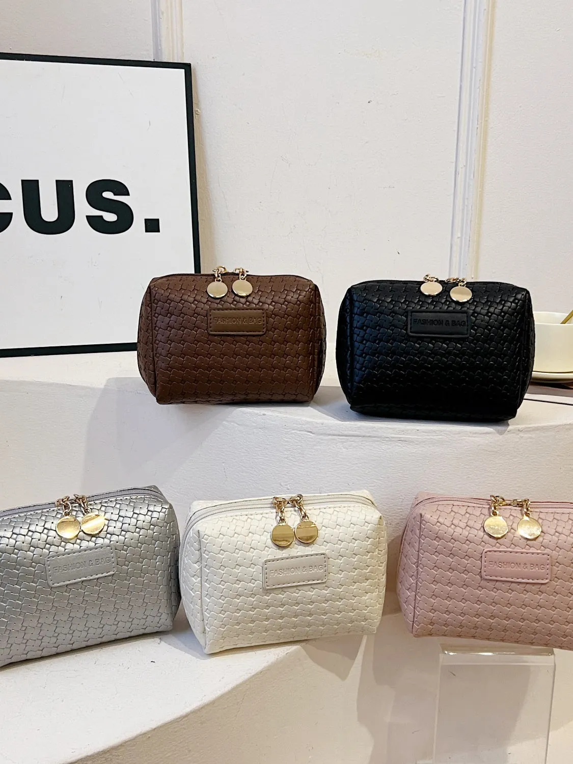 Elegant PU woven leather clutch