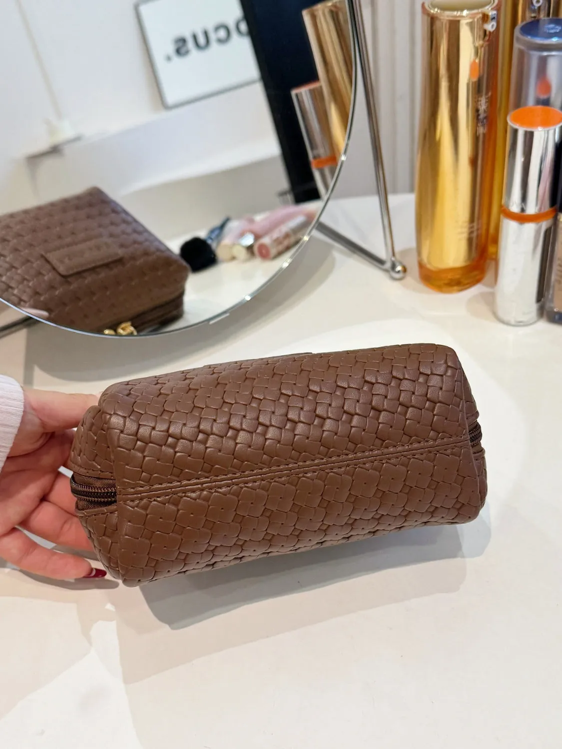 Elegant PU woven leather clutch