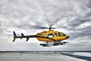 Posterazzi PSTTMO100628M A Bell 407 Utility Helicopter prepares to Land on The helipad of an Oil rig Poster Print, 17 x 11